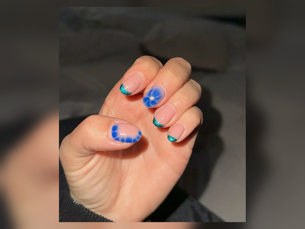 Blue flower BIAB nails by LM Beauty in Kilmarnock