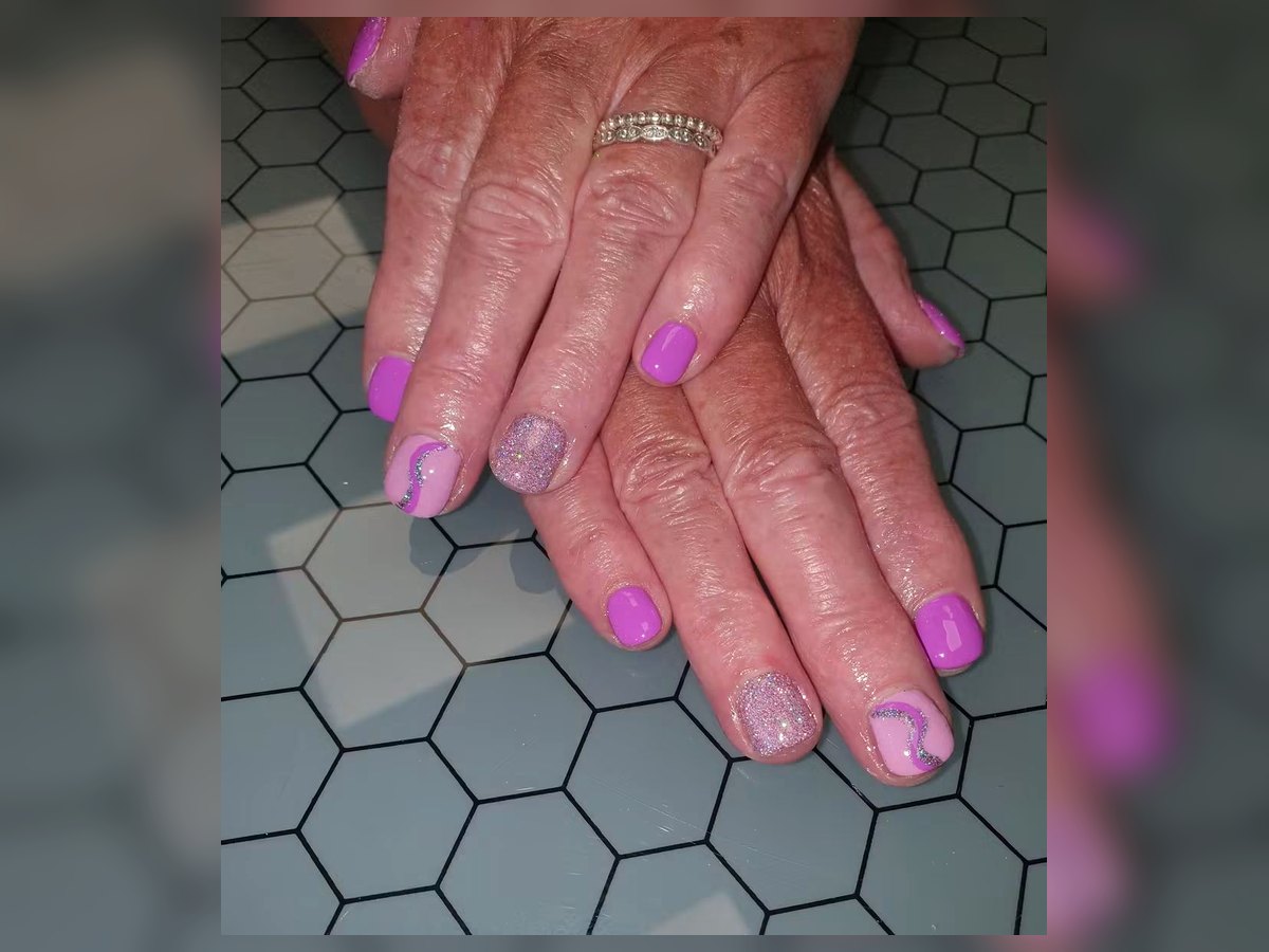 Pink glitter gel nails by LM Beauty in Kilmarnock