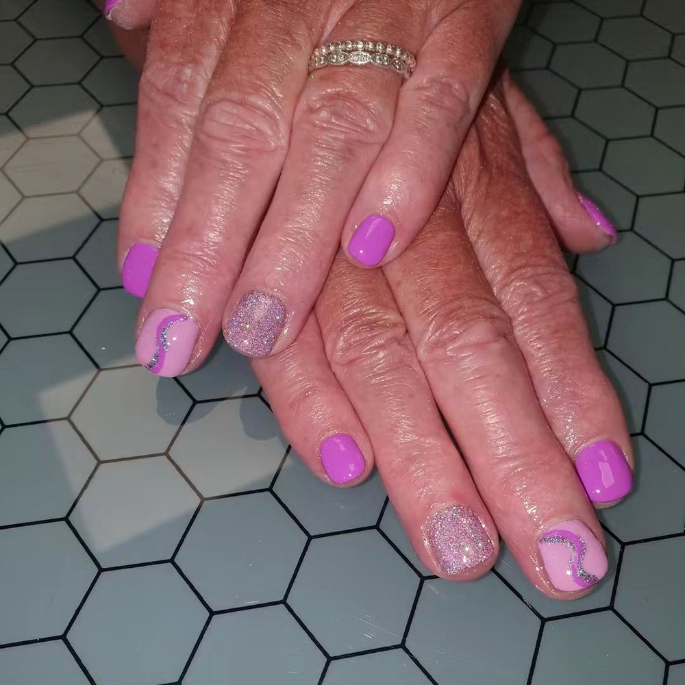 Pink glitter gel nails by LM Beauty in Kilmarnock